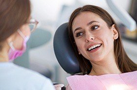 Smiling woman in dental chair