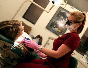 Dentist treating a patient