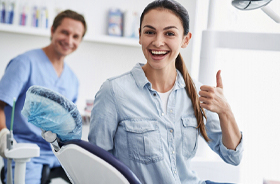 Dental patient giving thumbs up after ozone therapy in Marlton