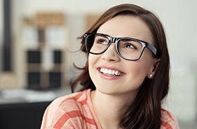 Smiling woman in glasses
