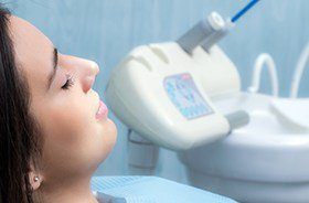 Relaxed woman in dental exam chair