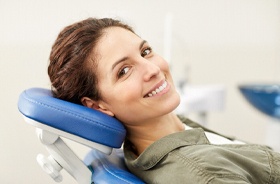 Relaxed patient at appointment to receive tooth-colored fillings